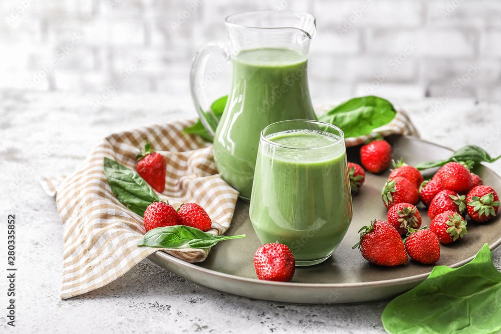 Composition with healthy smoothie on table