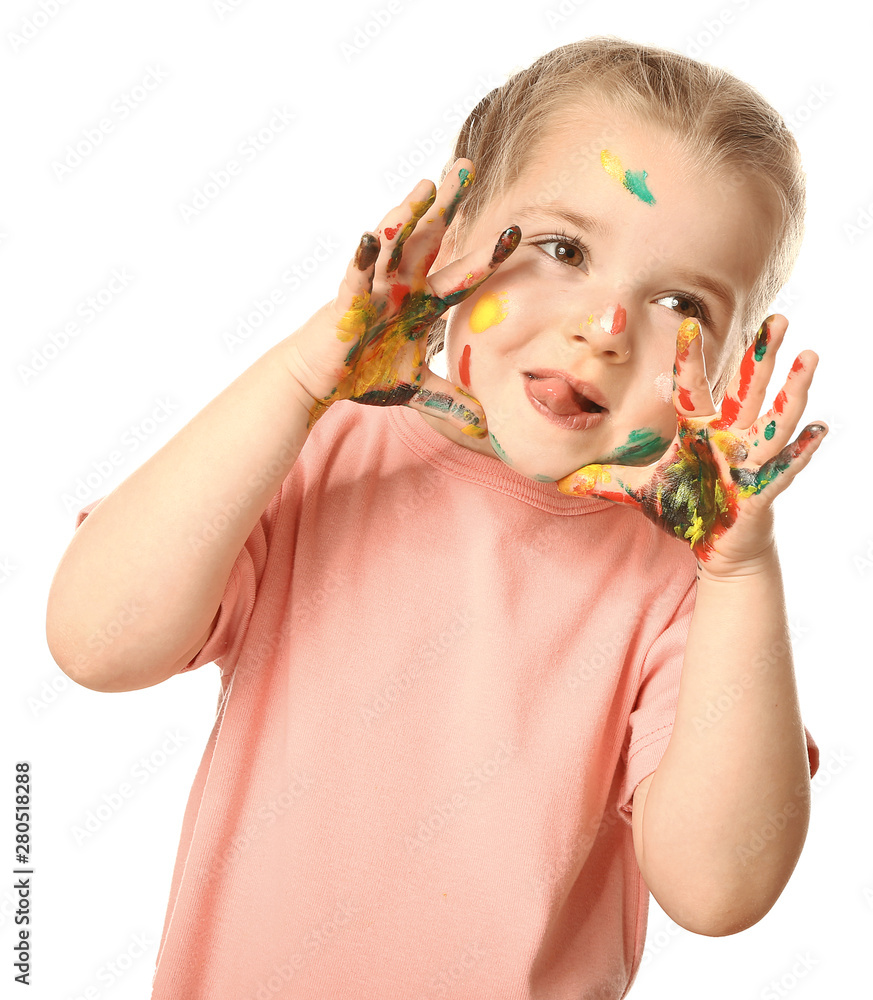 Funny little girl with hands and face in paint on white background