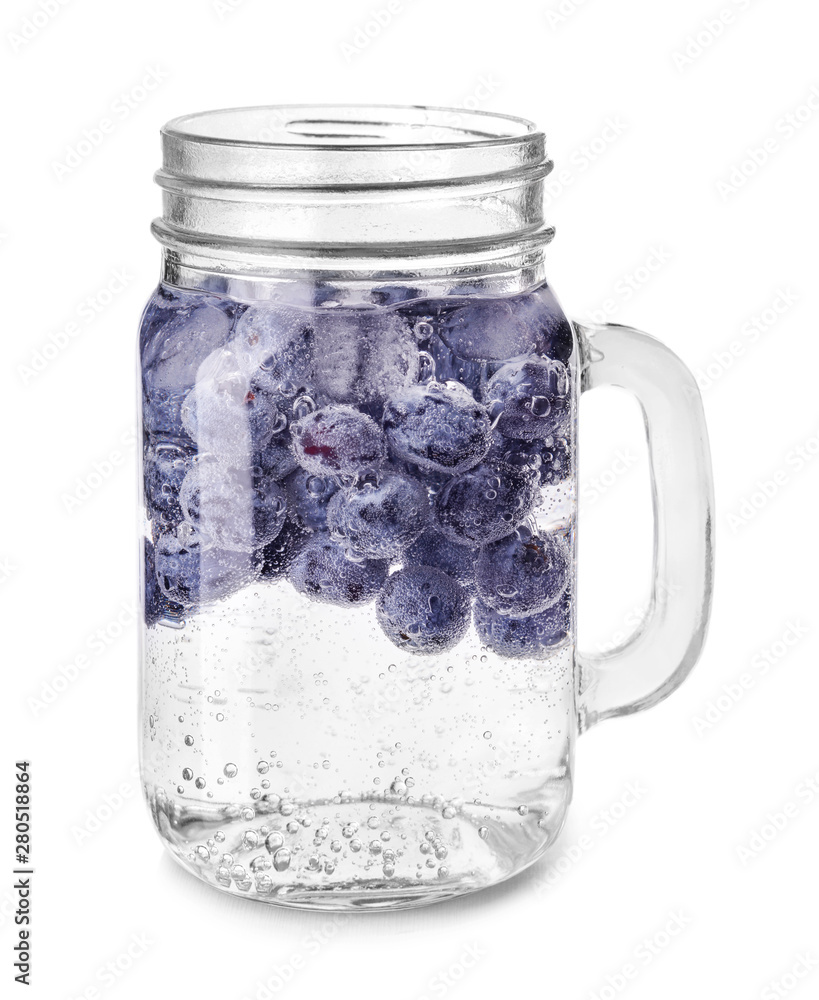 Mason jar of infused water on white background