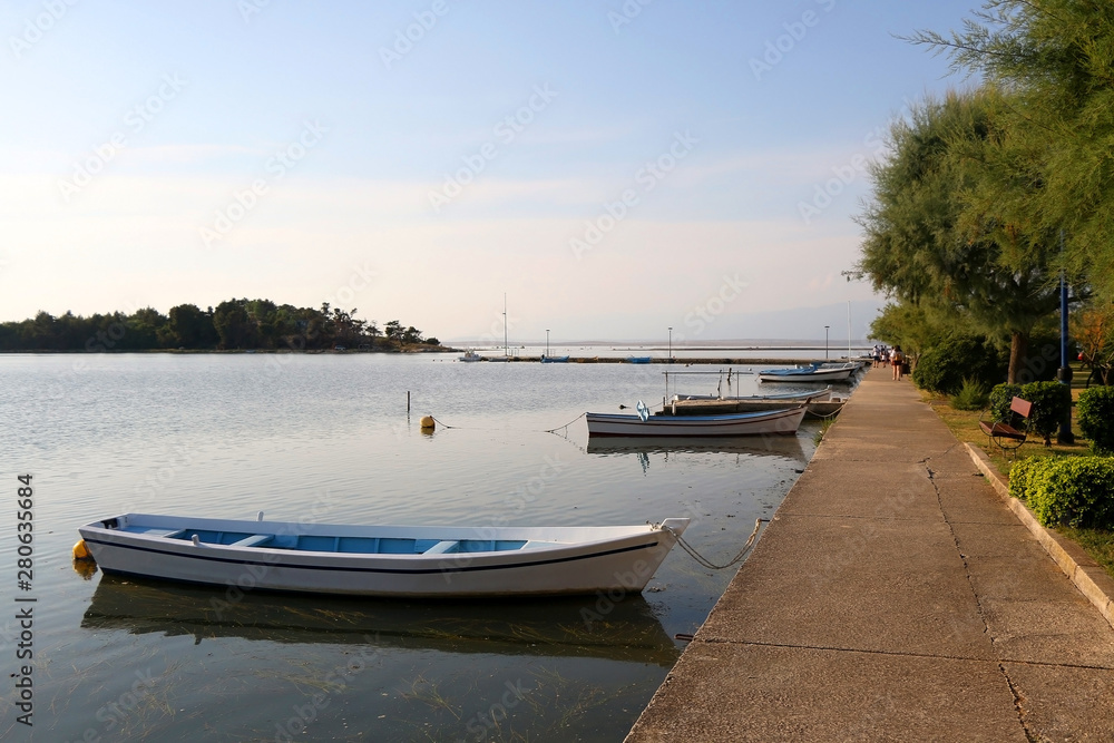 Traditional colorful wooden boats in port of Nin, Croatia.