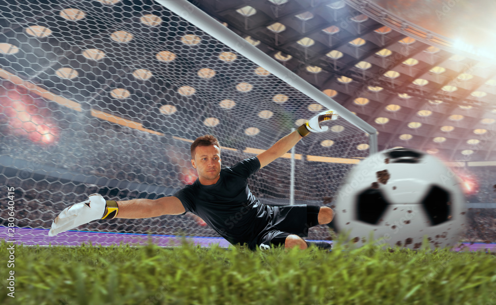 Soccer players in action on professional stadium on sunset.