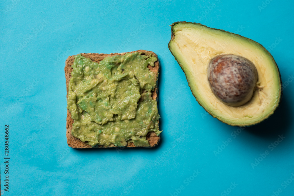 Cut avocado on clean surface