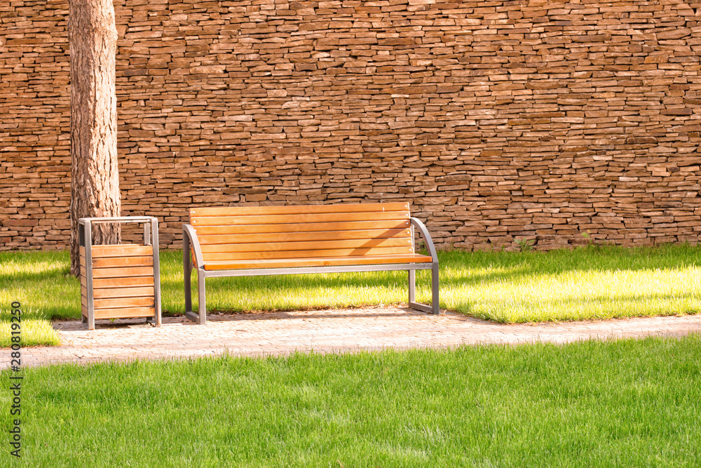 Wooden bench in city park