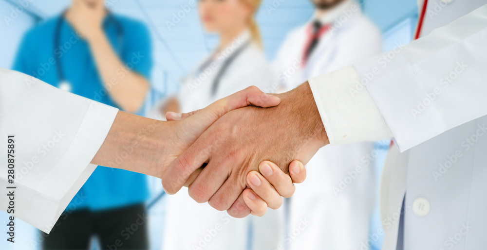 Healthcare people group. Professional doctor working in hospital office or clinic with other doctors