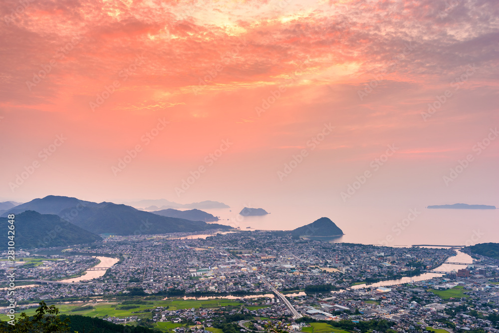 Hagi, Yamaguchi, Japan town skyline at dusk on the Sea of Japan.