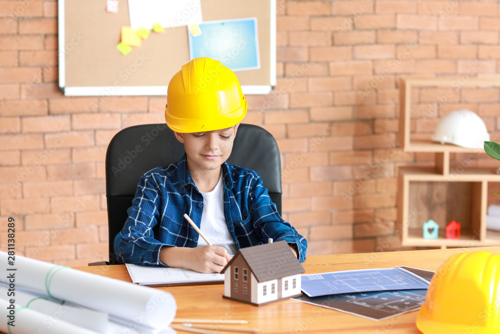 Cute little architect working in office