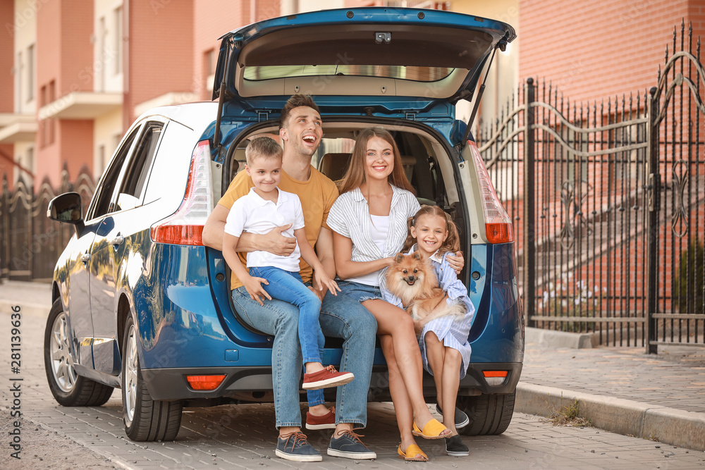 Happy family near car outdoors