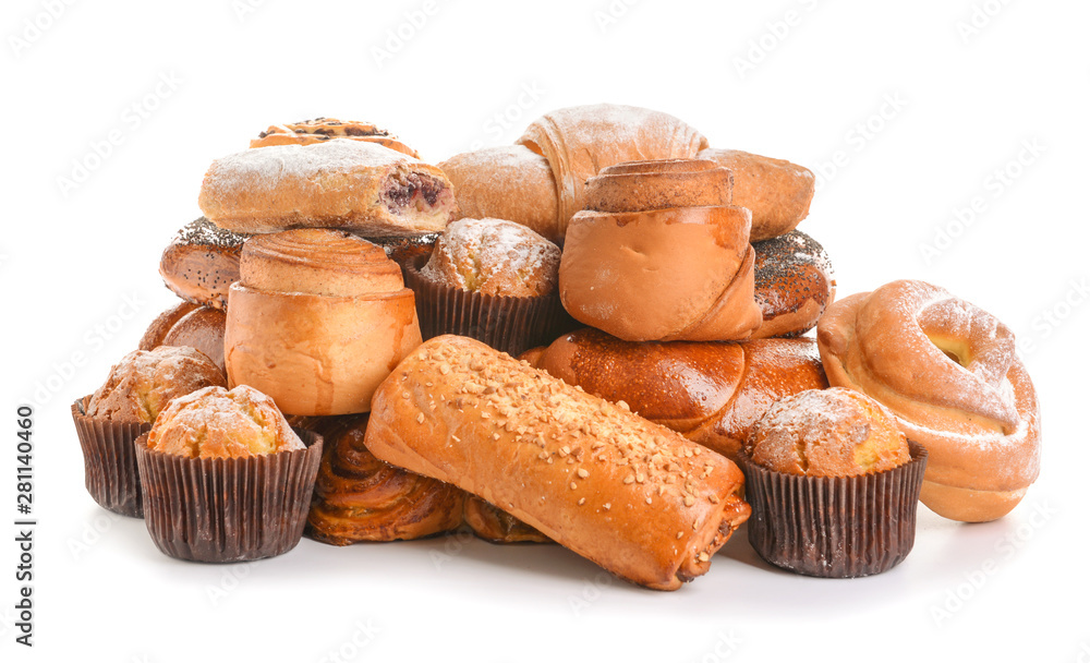 Heap of tasty pastries on white background