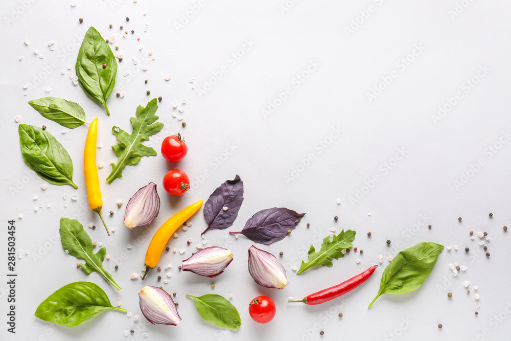 Fresh herbs with vegetables and spices on white background