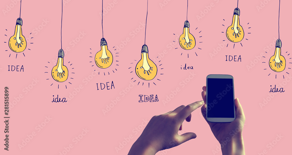 Idea light bulbs with person holding a white smartphone