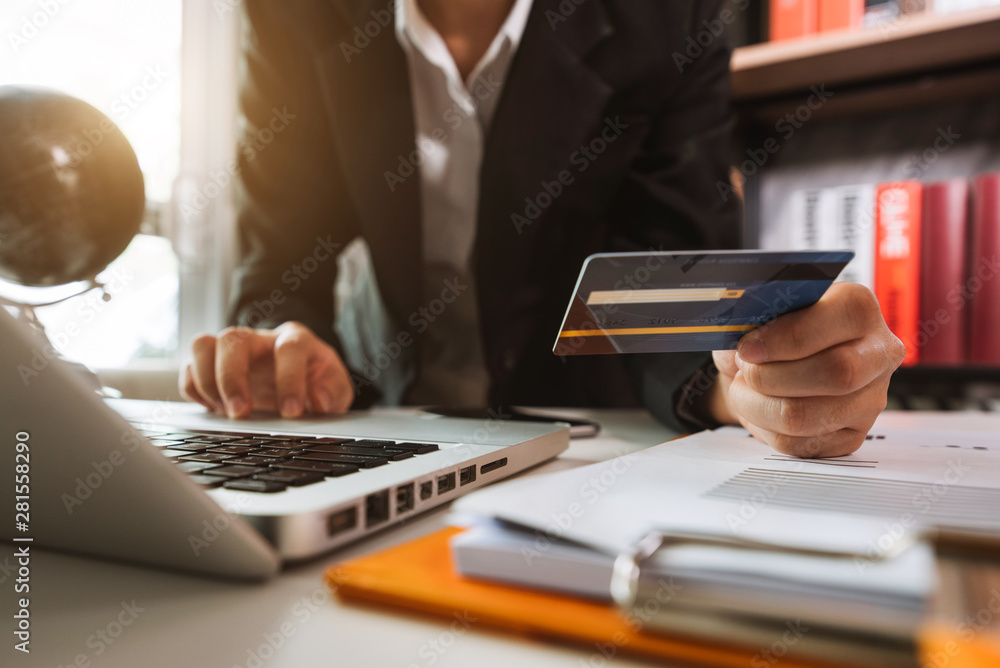 businesswoman hand using smart phone, tablet payments and holding credit card online shopping, omni 