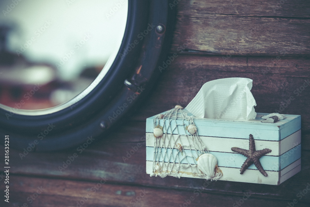 Toilet paper box made of wood, toilet paper, wood background, vintage concept