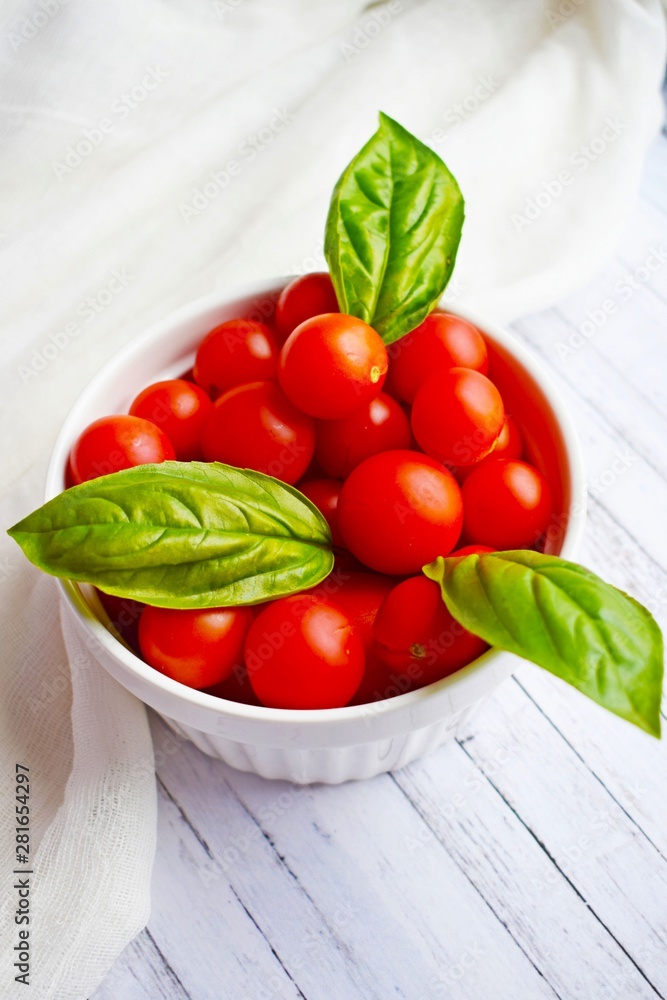 Fresh,ripe tomatoes on a wooden background.Healthy diet.