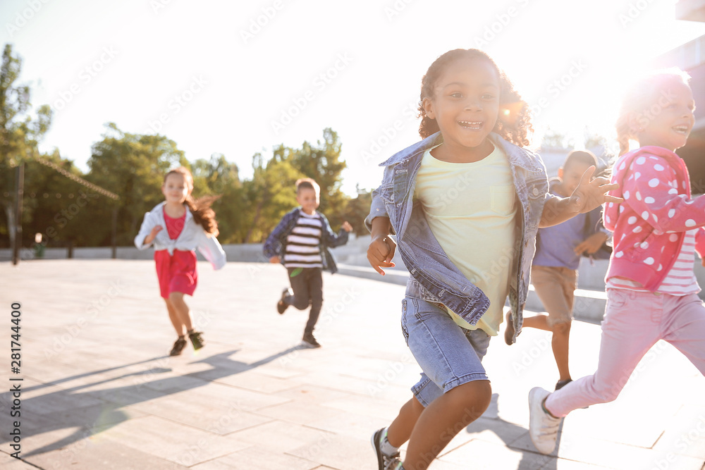 Group of running children outdoors