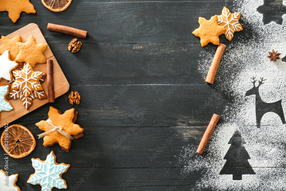 Composition with tasty Christmas cookies on wooden background