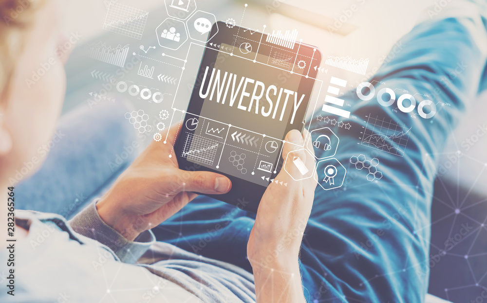 University with man using a tablet in a chair