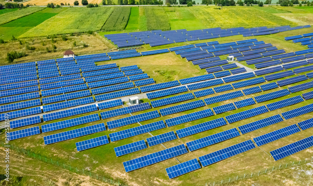 Aerial view to solar power plant. Industry and renewable resources theme.