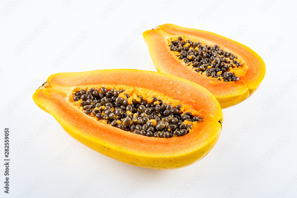 Papaya cut from a fresh fruit on a white background