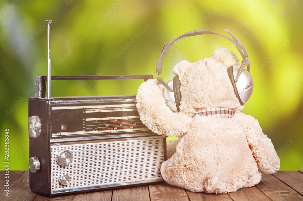 Teddy bear in headphones and radio