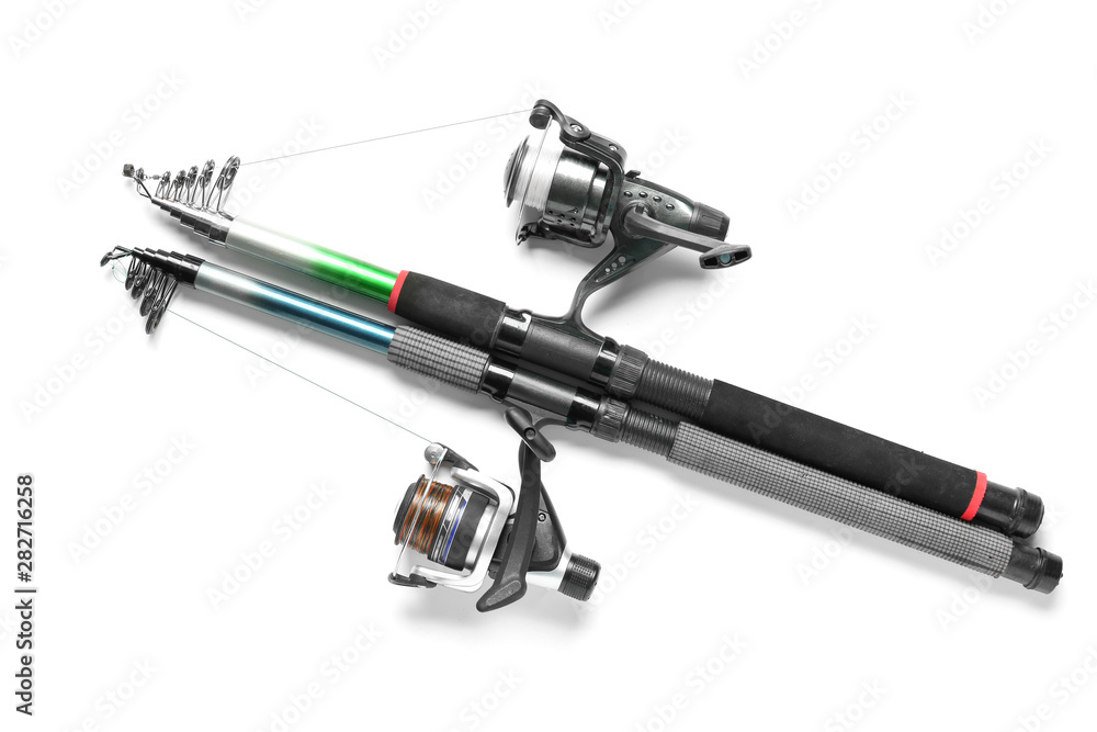 Modern fishing rods on white background