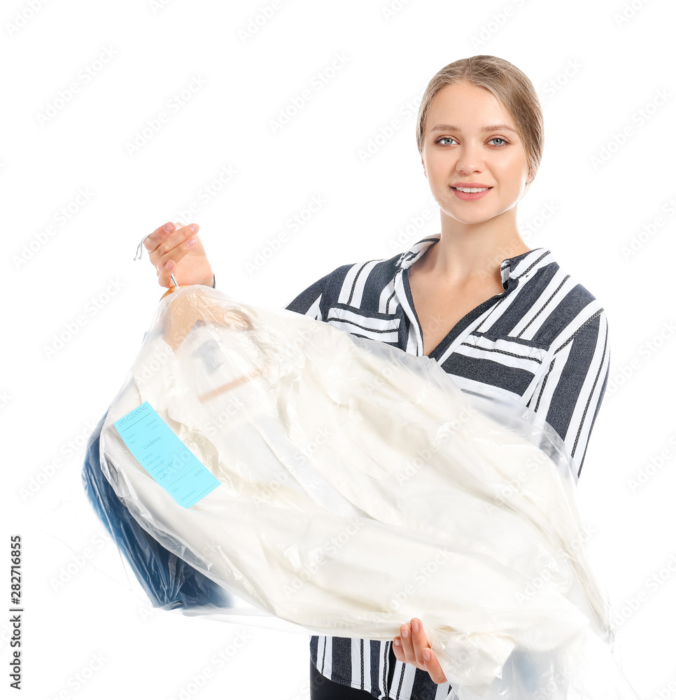 Woman with clothes after dry-cleaning on white background