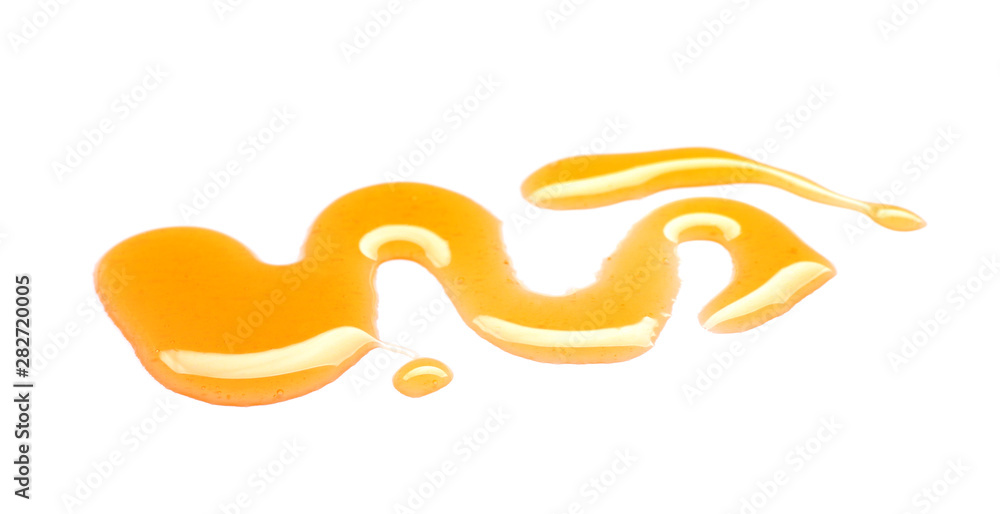 Spilled honey on white background