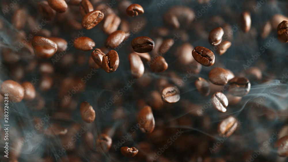 Coffee beans flying in the air, macro photo