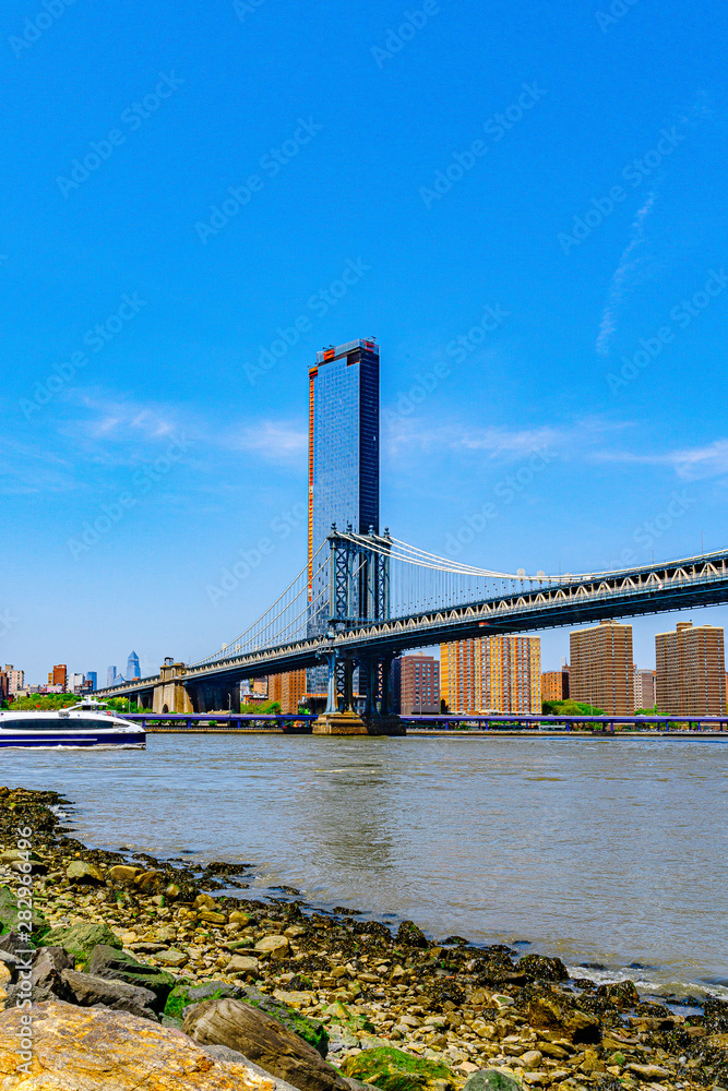 Manhattan Bridge over East River and waterfront condominium Manhattan New York City