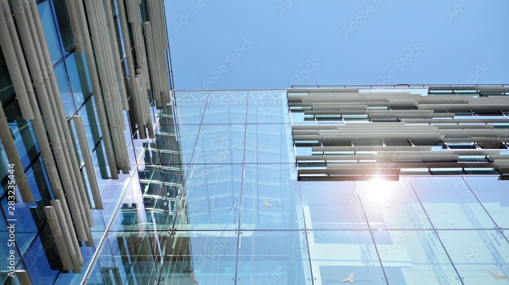  Modern office building with reflection in windows of building. New office building in the city cent