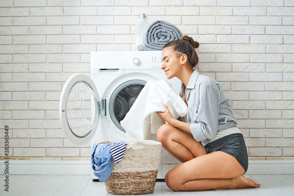 woman is doing laundry