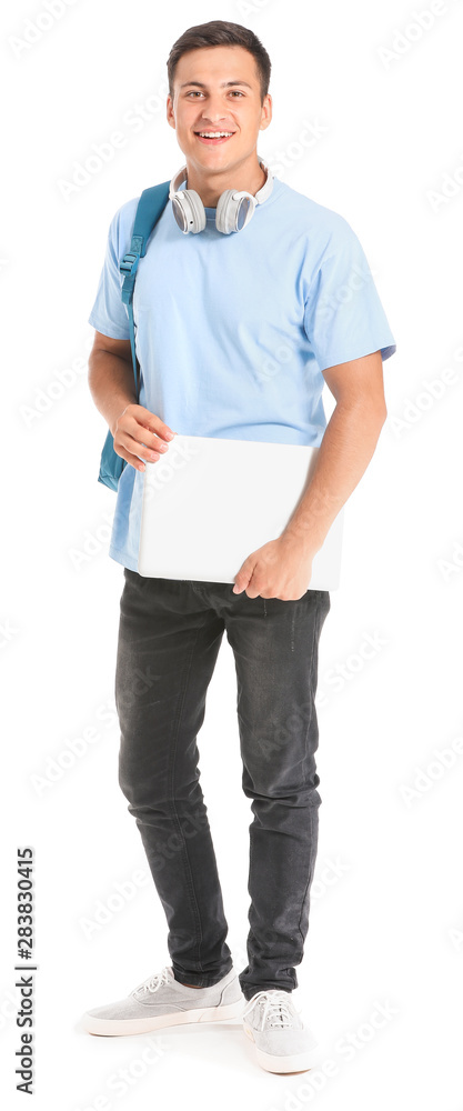 Portrait of young student with laptop on white background