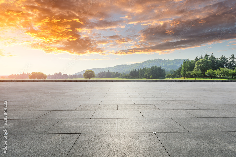 Empty floor and green woods with mountain natural scenery in city park