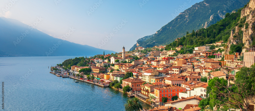 Scenic view on Lake Garda  in Limone sul Garda town, famous tourist destination in Italy