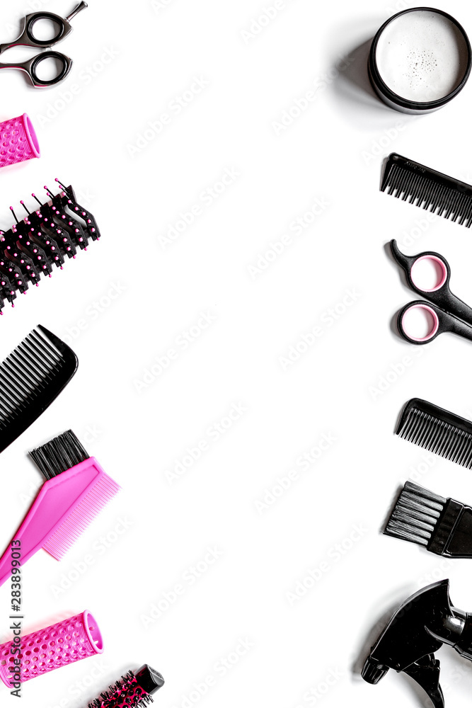 Tools for hair styling on white background top view