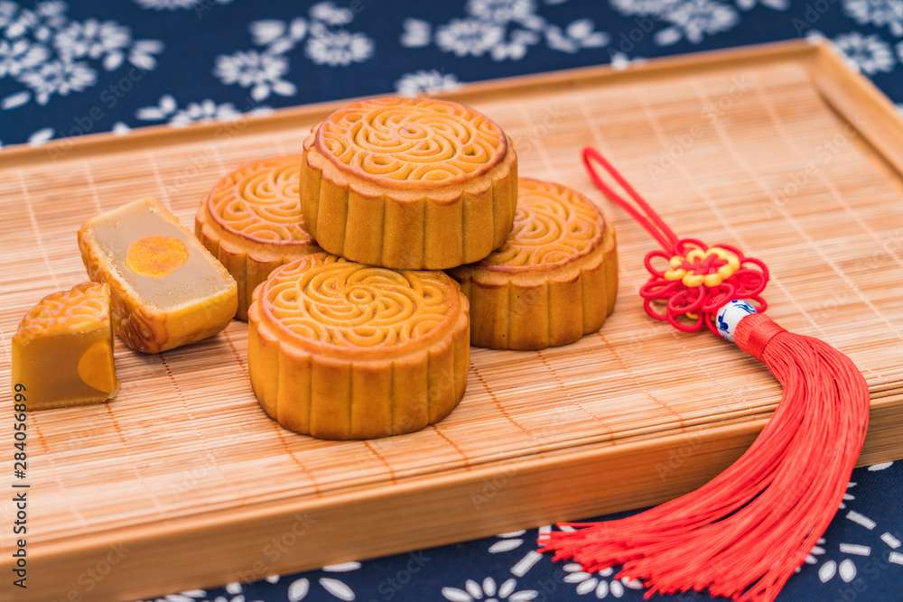 Chinese Mid-Autumn Festival delicious mooncakes on trays