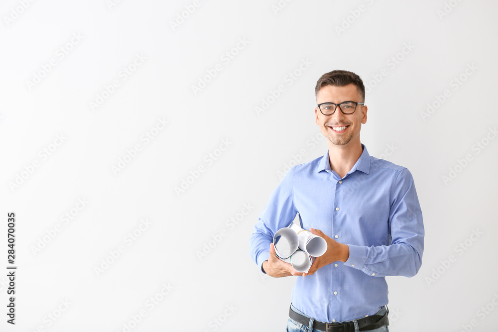 Handsome male architect on white background