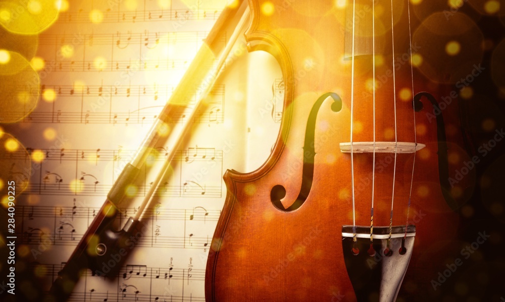 Classic violin And Musical Notes with abstract light