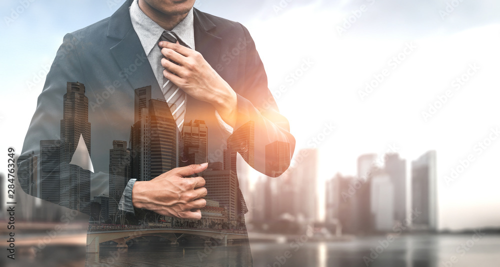 Double Exposure Image of Business Person on modern city background. Future business and communicatio