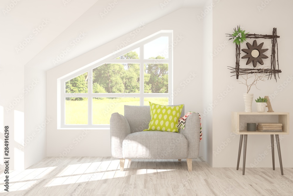 Mock up of stylish room in white color with armchair and green landscape in window. Scandinavian int