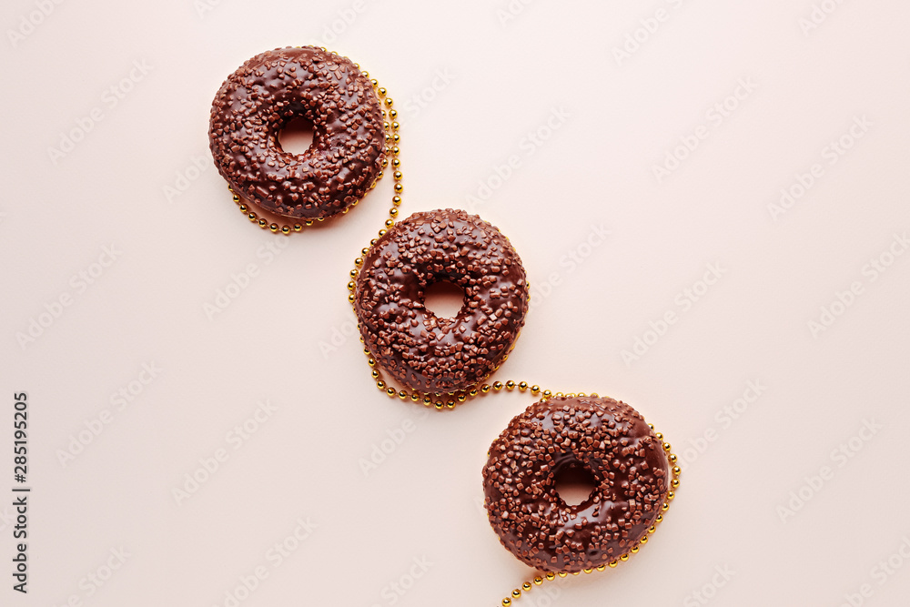 Sweet tasty donuts on color background