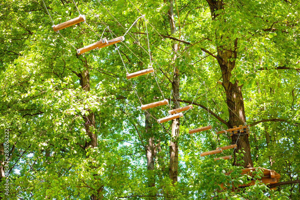 Ropes park suspended path walk high on the trees