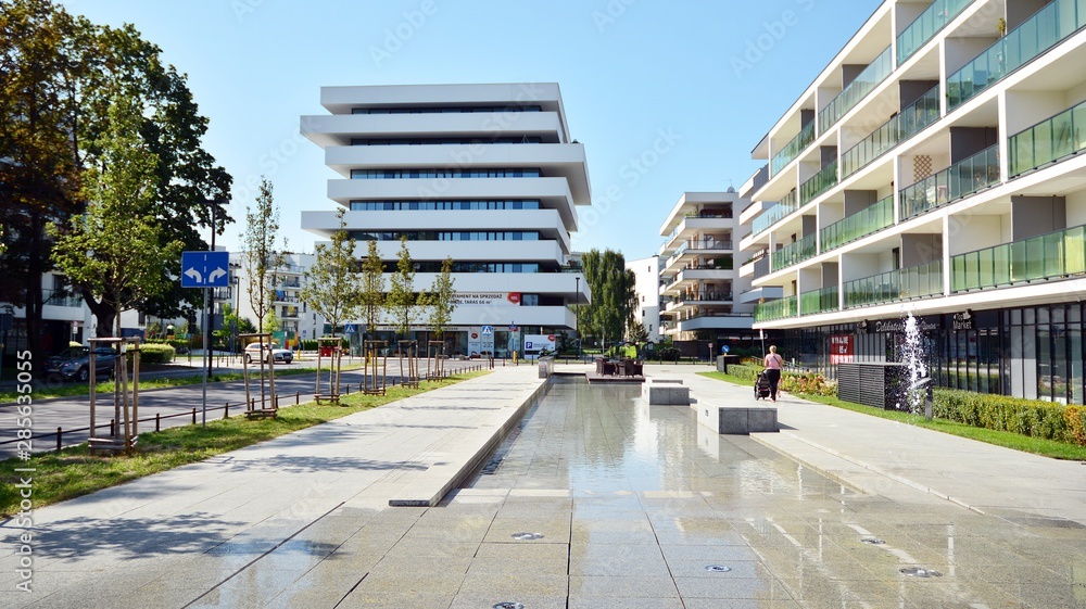 Contemporary residential building exterior in the daylight. Modern apartment buildings on a sunny da