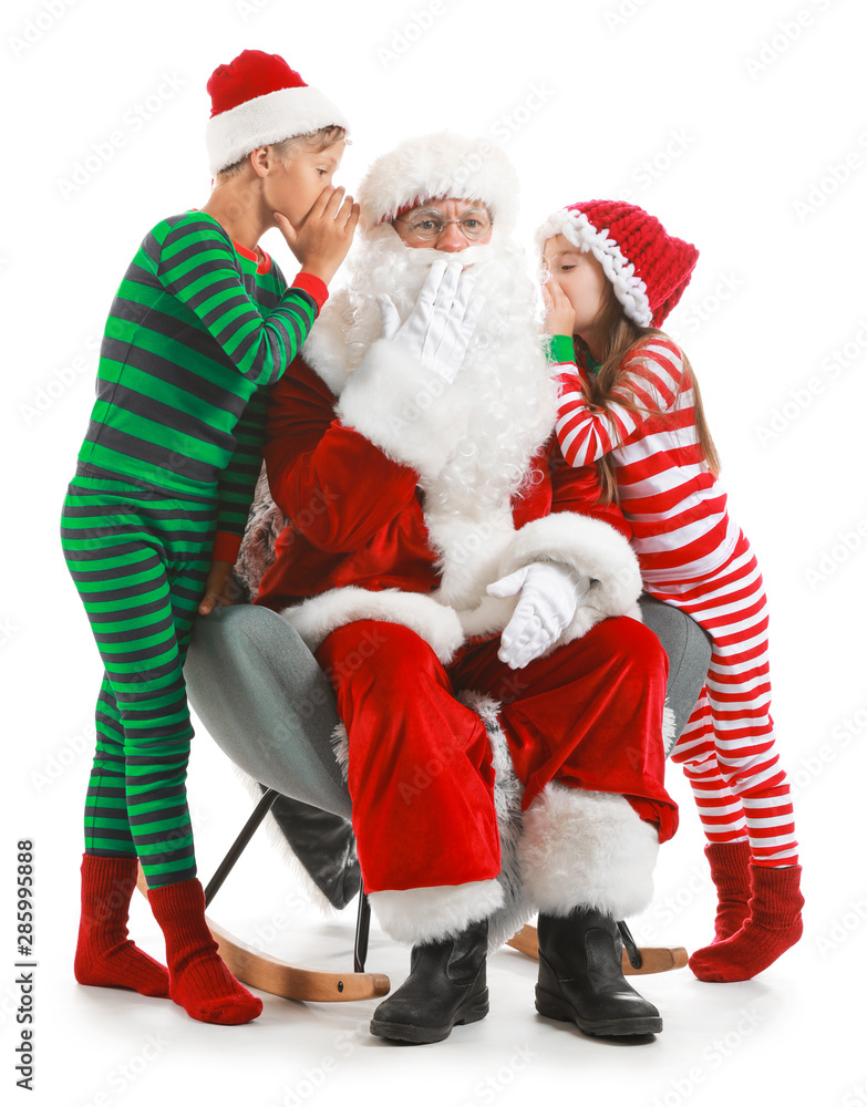 Little children telling Santa their wishes against white background