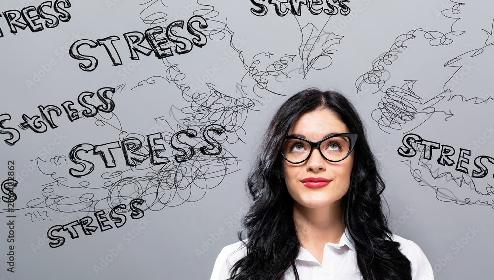 Stress theme with young businesswoman in a thoughtful face