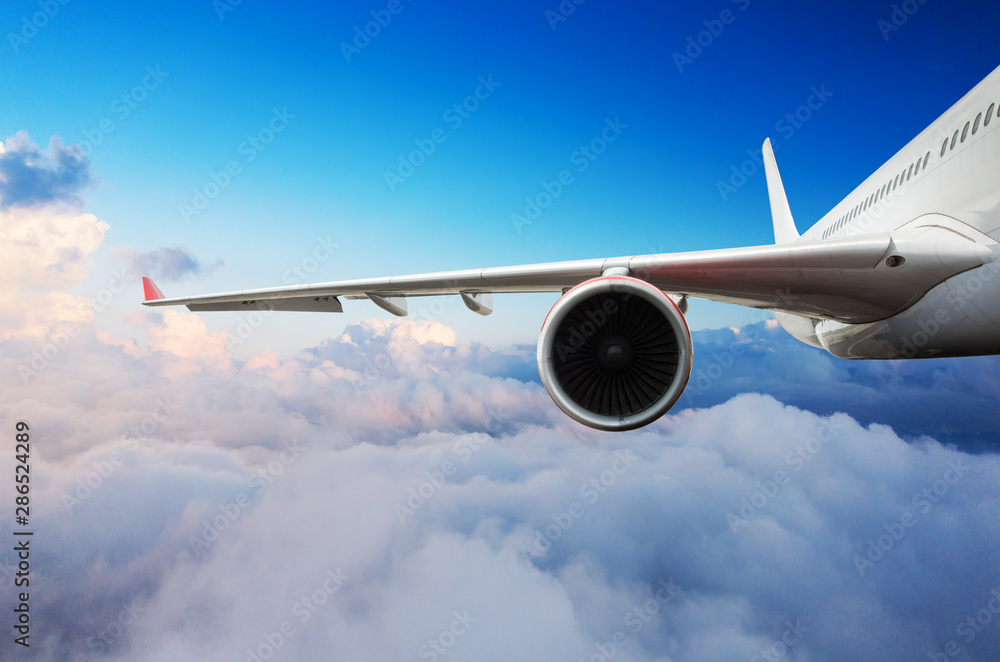 Detail of passengers commercial airplane wing