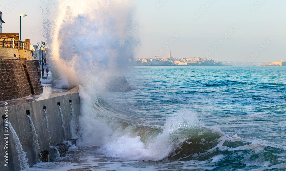 Big wave crushing during high tide in Saint-Malo