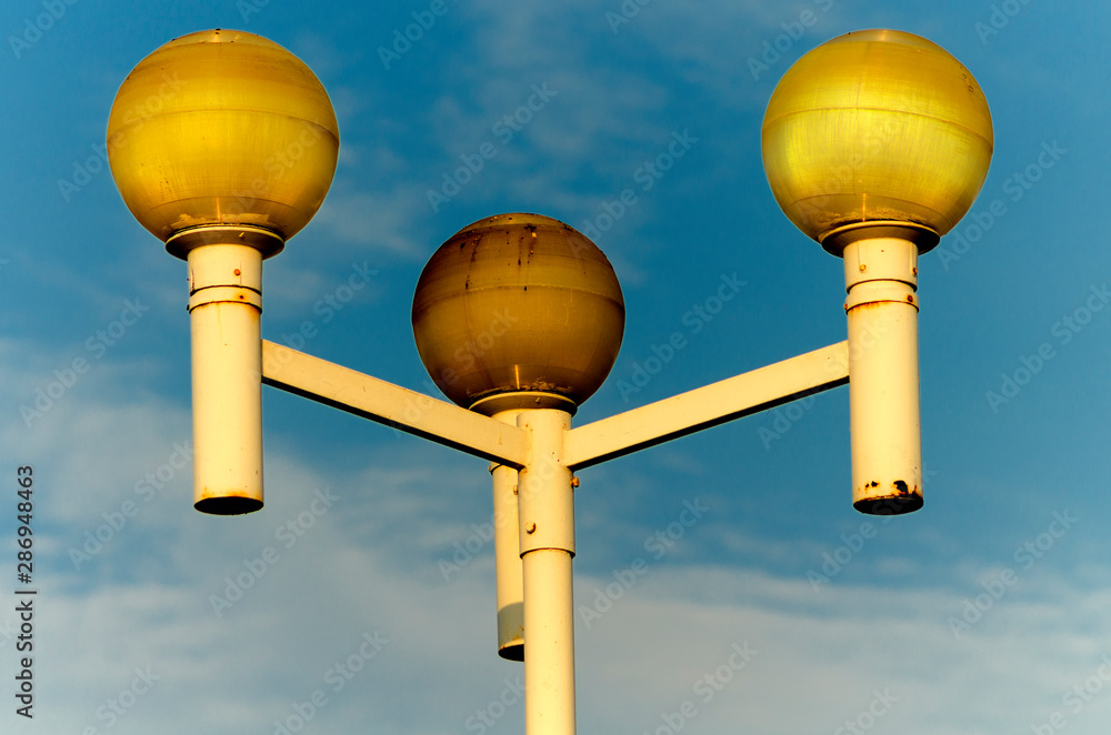 street lamp on blue sky