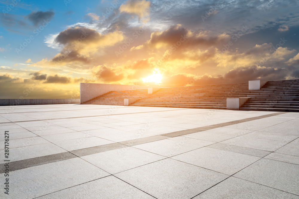 Wide square floor and beautiful sky clouds at sunset