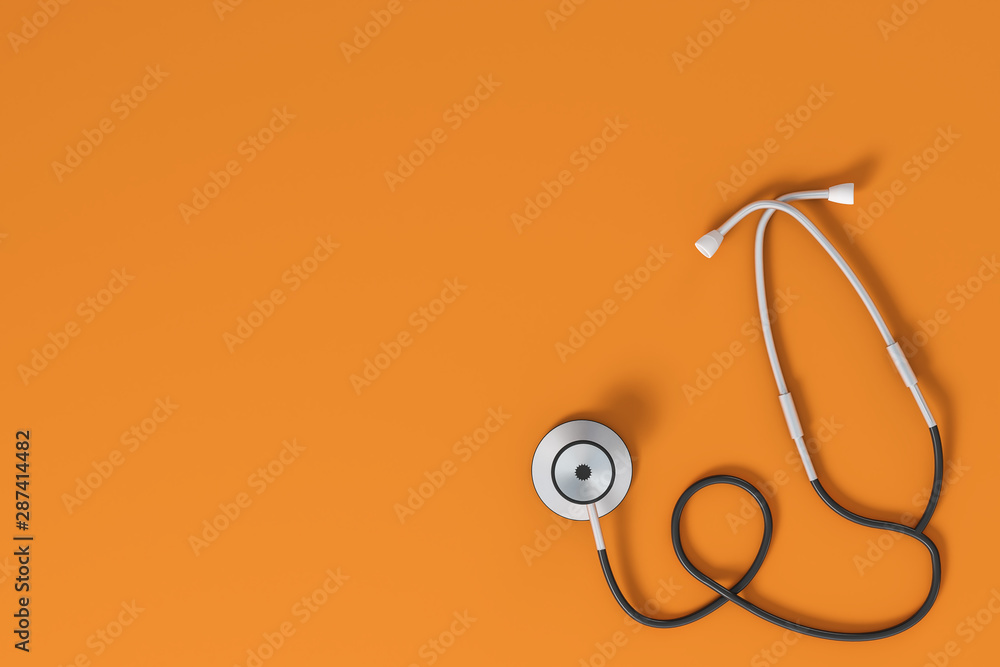 Stethoscope on orange background