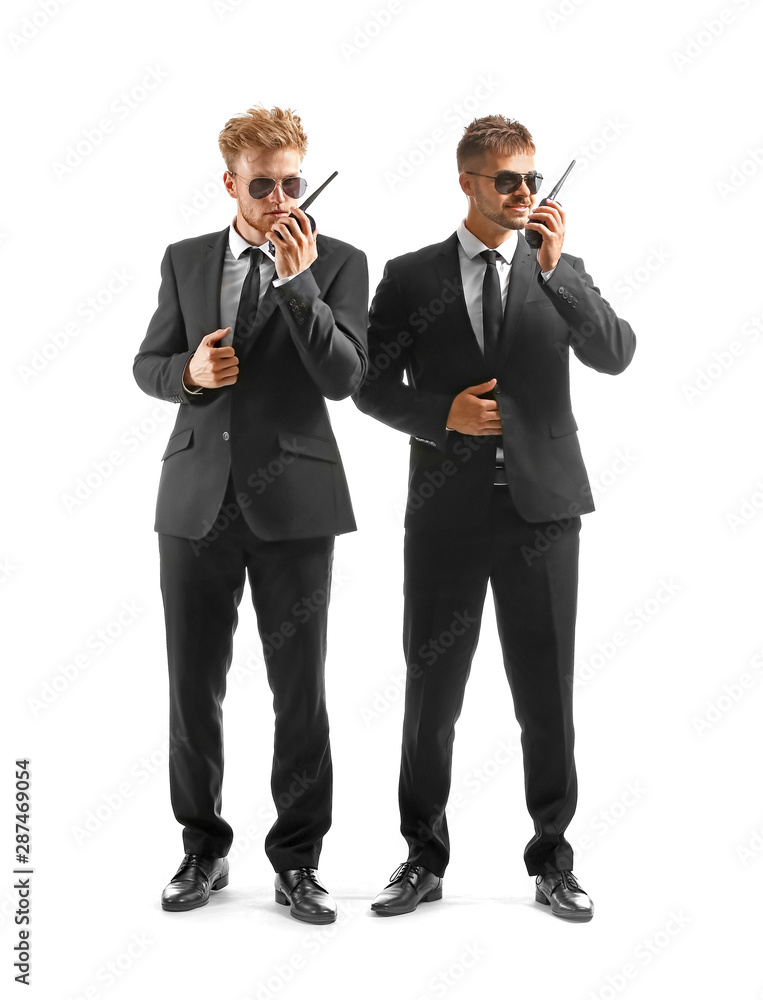 Handsome security guards on white background